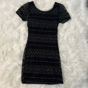 Black lace and gold thread dress